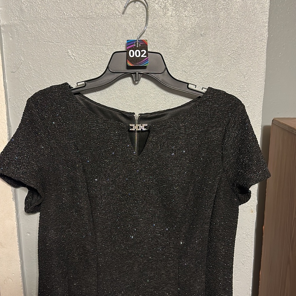 Black dress with silver sparkles  Ptp 20.  Long 38